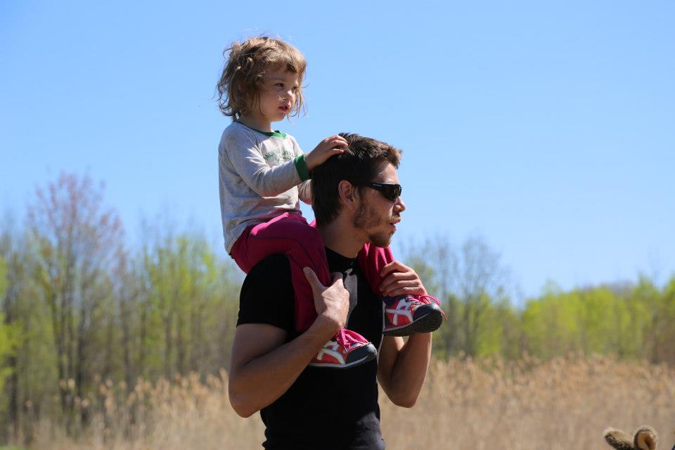 Father Kylik with autistic daughter on his shoulders in Inuvik, Canada