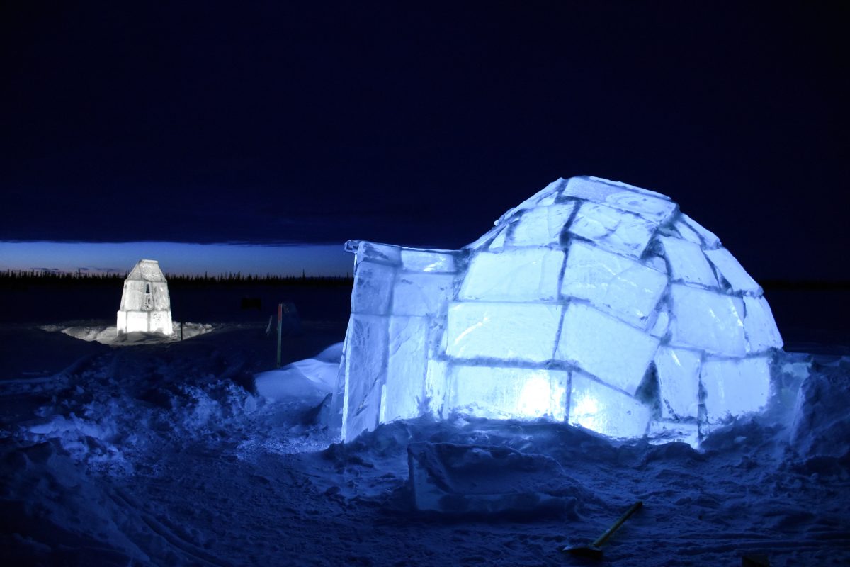 After reindeer herding, tired guests cozy up in their igloos.